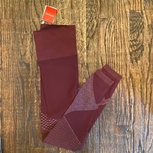 NWT spanx seamless moto leggings. Color is wine